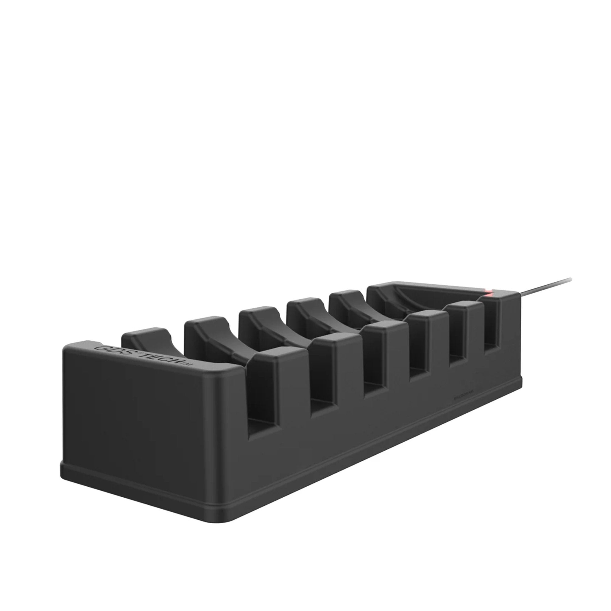 Empty 6-port rugged charging dock with device slots on white background