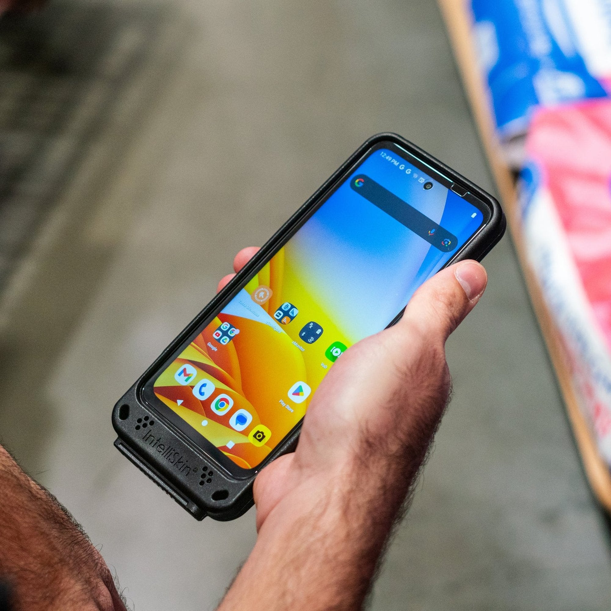 IntelliSkin Zebra handheld case in use during warehouse operations